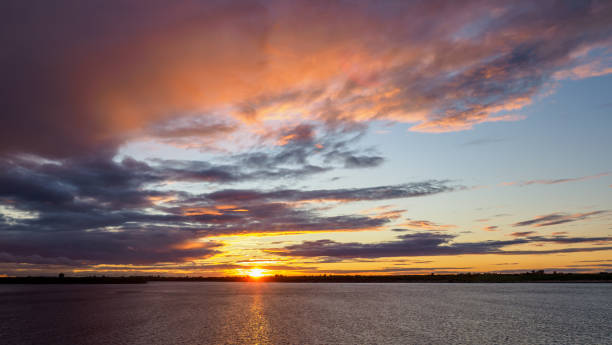 istock Beautiful sunset over the big river. 1253454650