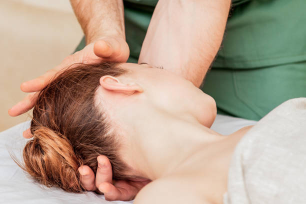 istock Head massage of woman. 1253454755