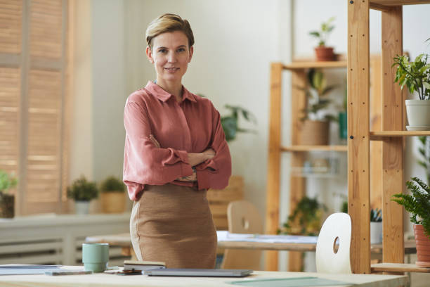 istock Successful Businesswoman Posing at Office Workplace 1253456404