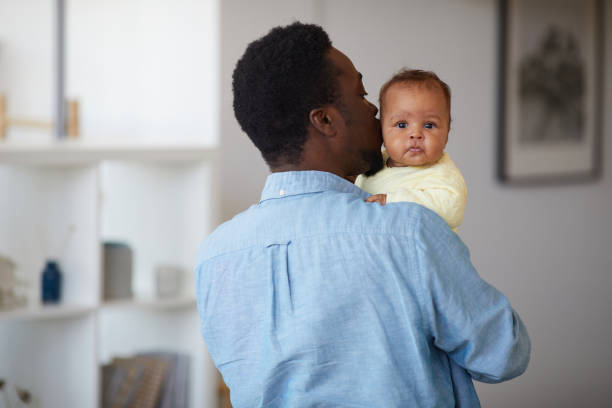 istock Father with baby girl 1253459099