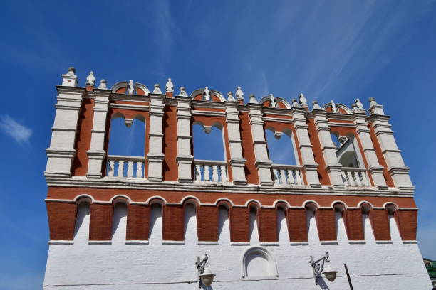 Kremlin red and white ballastrade against a deep blue sky