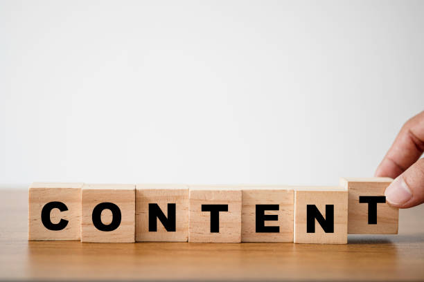 istock Hand putting wooden cubes block which print screen content wording on the table. Creative business marketing concept. 1253459879