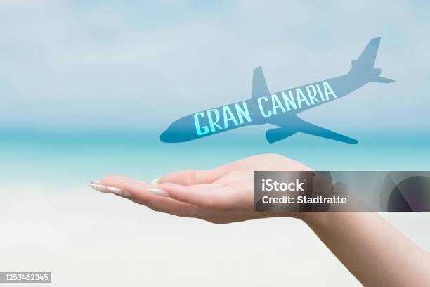 Holidays On The Beach And Plane To Gran Canaria Stock Photo - Download Image Now - Aerospace Industry, Aiming, Airplane