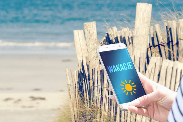 istock Beach, smartphone and summer holidays in Poland 1253463858