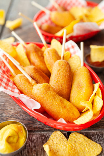 istock Corn Dogs, sausage on a stick 1253464814