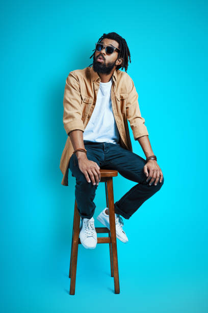 istock Full length of handsome young African man 1253465303