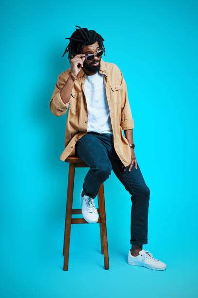 istock Full length of charming young African man 1253465445