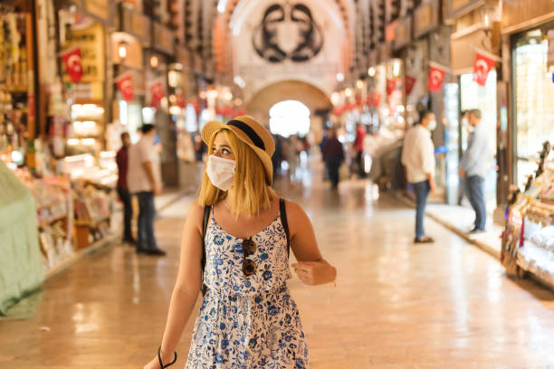Young woman walks in Egyptian bazaar in Istanbul,Turkey stock photo