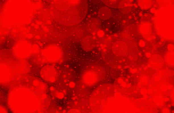 istock Abstract red luxury bokeh background with defocused circles 1253467231
