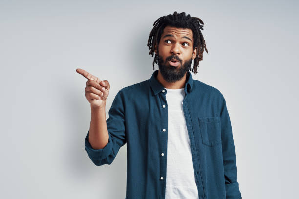 istock Handsome young African man in casual wear 1253467378