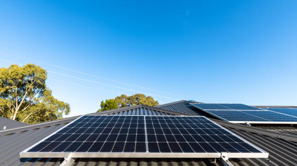 istock Solar panels in landscape position on house roof 1253471216
