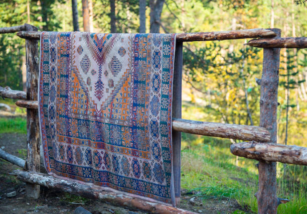 istock Cleaning carpet in the village 1253471621