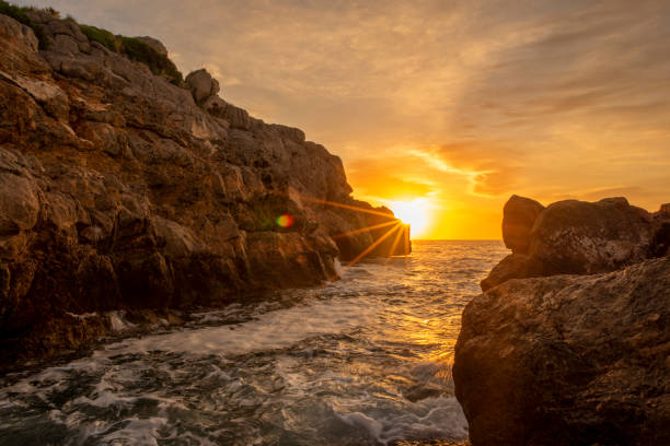 istock Sunrise between the rocks of the renega in Oropesa 1253472615