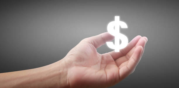 istock Money icon us dollar in  hand, business concept 1253472723
