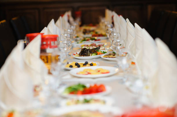 istock table set service with silverware and glass stemware at restaurant before party 1253477951