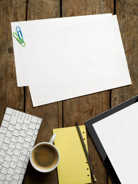 istock Blank paper and office supplies 1253488235