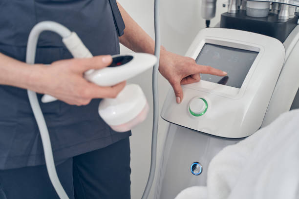 istock Modern ultrasound slimming device with convenient touch screen 1253490647