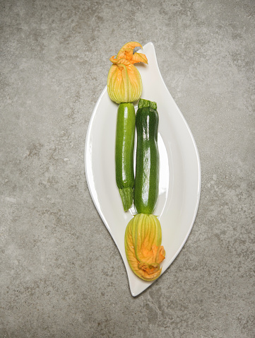 Young Courgette with Flower on Plate