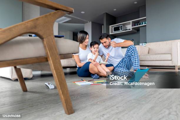 Mom Dad And Son Do Homework Stock Photo - Download Image Now - Child, Coronavirus, Family