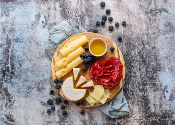 delicious assortment of cheese - italian cuisine wine food pasta imagens e fotografias de stock