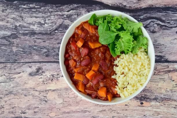 Cooked red kidney beans sweet potato tomato chili, brown rice, spinach and kale