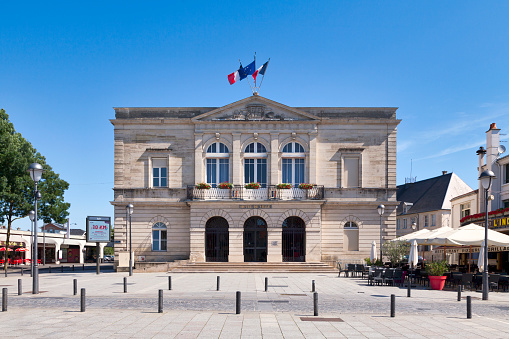 Saint-Dizier, France - June 25 2020: The City hall of Saint-Dizier was erected in 1863 on stilts instead of an old bastion.