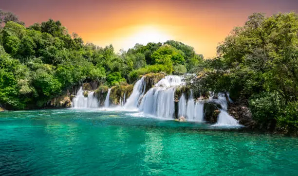 Photo of Panoramic landscape with beautiful waterfalls during the sunset in KRKA National park, Croatia.