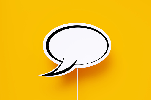 White and yellow speech bubble on background. Chat icon symbolic. Online message, Comment or communication concept. 3d render