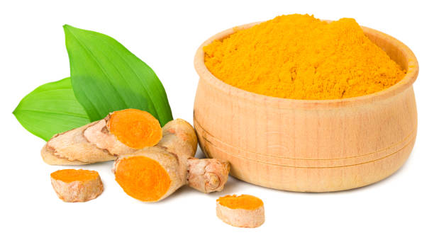 istock Turmeric powder with turmeric root isolated on white background 1253505508