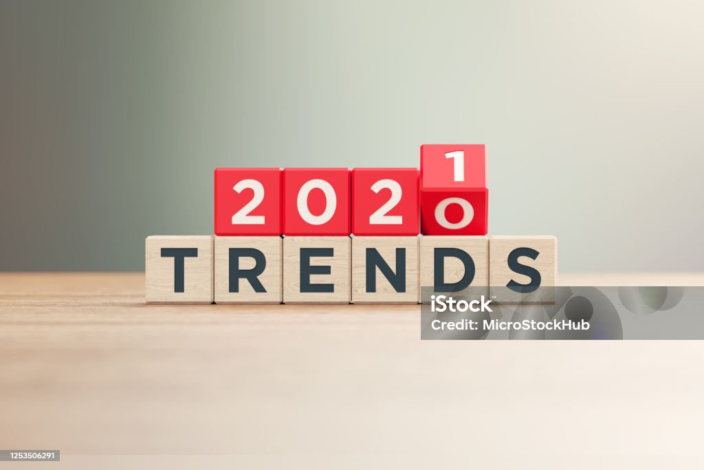 "2020"과 "2021 동향" 서면 빨간 나무 블록 앞에 나무 표면에 앉아 디포커스 배경 - 로열티 프리 그래프 스톡 사진