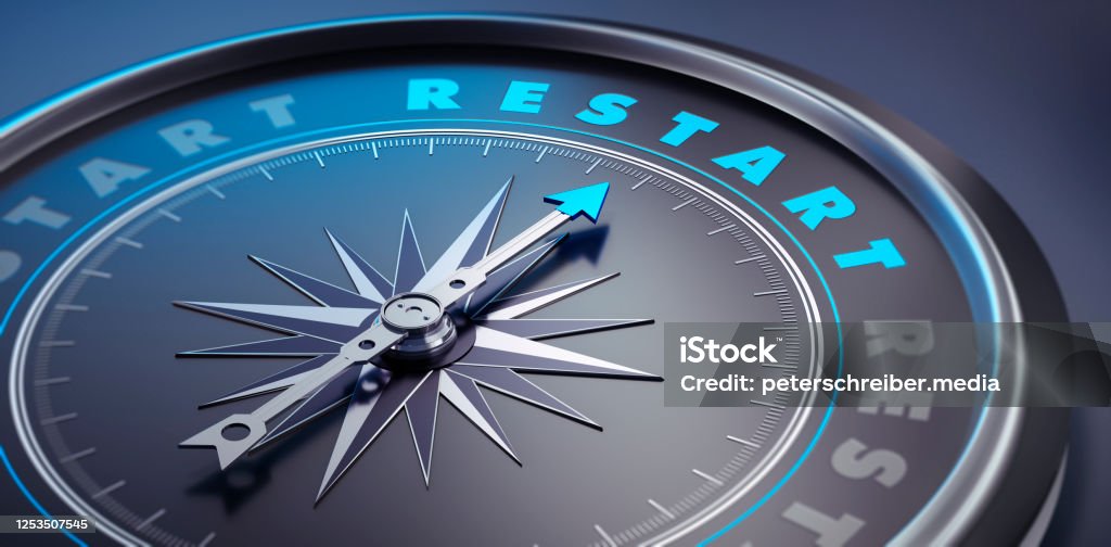 Dark Compass - Concept Business Restart Dark stylish compass with needle pointing to the word restart - Restart after Covid-19 Restarting Stock Photo