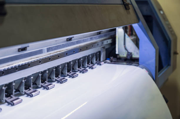 istock Large inkjet printer printing on vinyl paper 1253507738