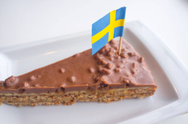 Daim chocolate cake with the flag of Sweden. Closeup