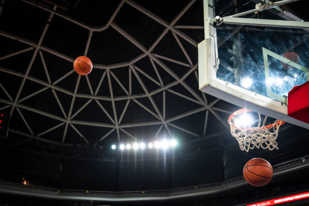 istock Basketball in hoop 1253510742