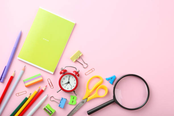 istock School office on a colored background top view. Office office, student office. Concept back to school. place for text. Flatlay 1253514961