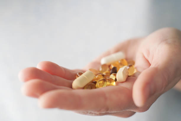 istock medical pills in a hand 1253516333