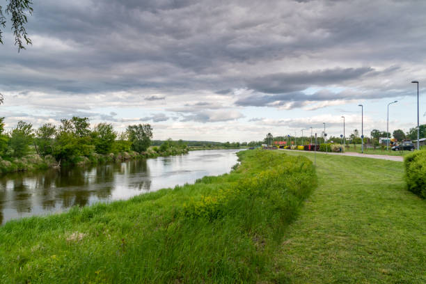 istock Boulevards on Narew river in the evening in Lomza. 1253516391