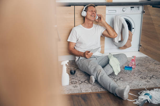 istock Kind mature man having rest at home 1253516756