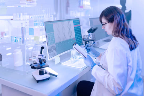 istock Female scientist at work. Human Exoskeleton Project 1253517947