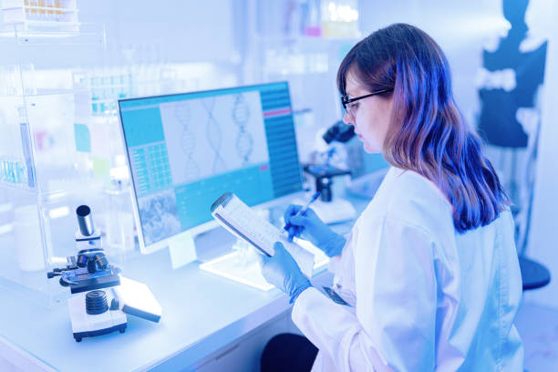 istock Female scientist at work. Human Exoskeleton Project 1253517993