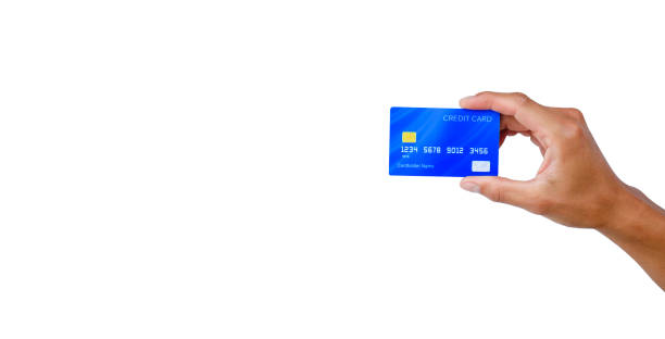 istock hand holding a blue credit card on white background with clipping path. 1253518200