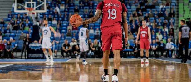 istock Basketball player with ball 1253521301