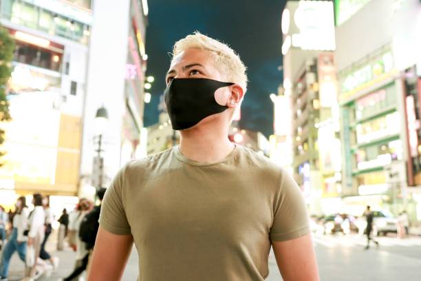 istock Portrait of hispanic man wearing Protective Face Mask 1253521709