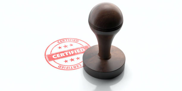 istock Wooden round rubber stamper and stamp with text CERTIFIED isolated on white background. 3d illustration 1253524133