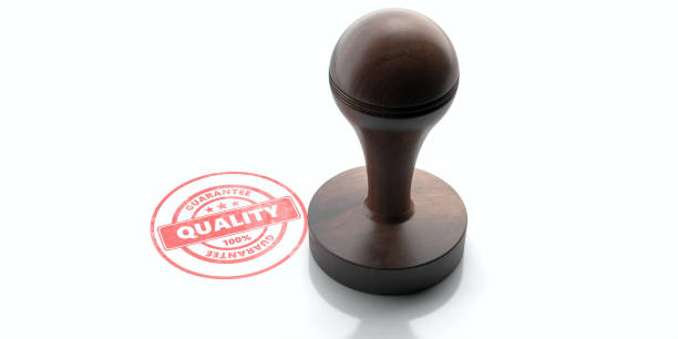 istock Wooden round rubber stamper and stamp with text quality isolated on white background. 3d illustration 1253524142