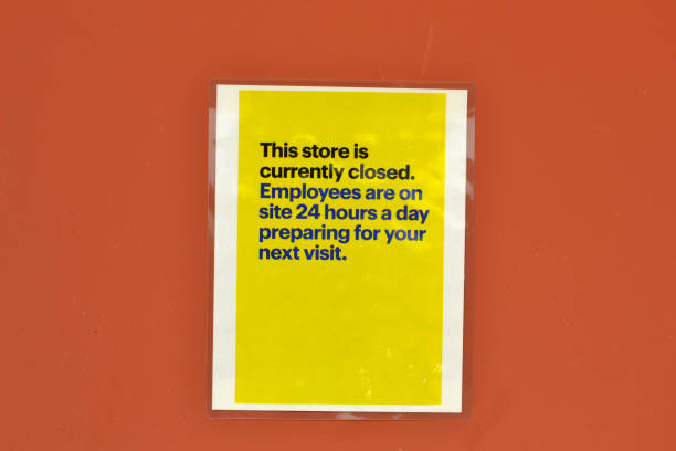 istock This Store Is Currently Closed - Yellow Signage 1253527685