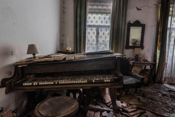 istock oblique broken piano in a room 1253529277