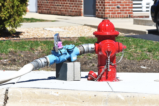 Monitoring hydrant output with an attached valve.