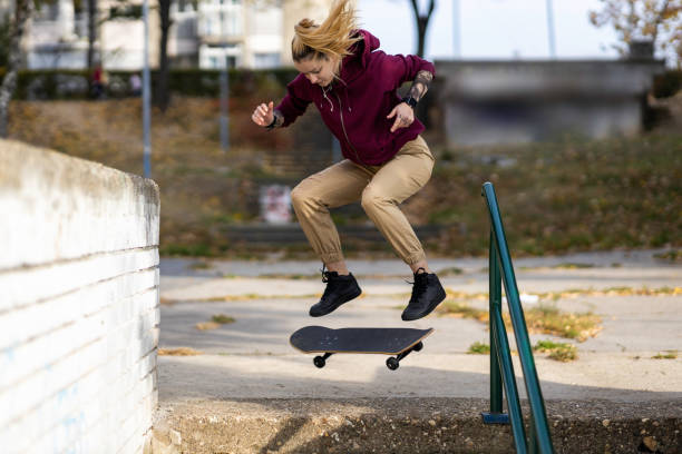 istock Young female skateboarder 1253534558