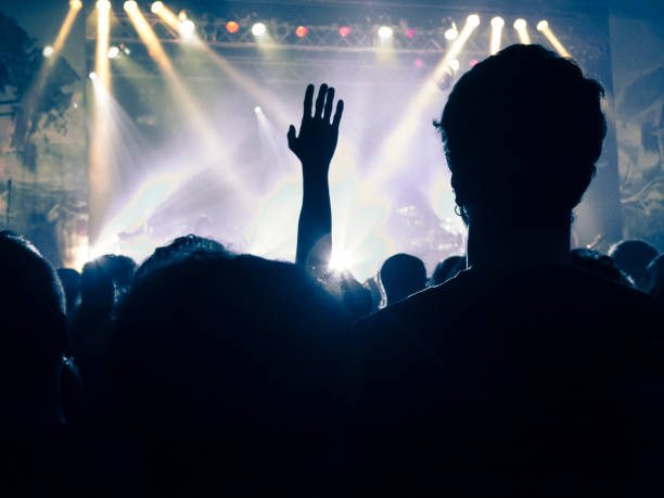 istock Filming concert on smart phone 1253541335